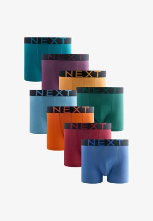 Ocho pares de bóxers para hombre en varios colores con cinturillas negras etiquetadas como "NEXT," dispuestos en dos filas escalonadas.