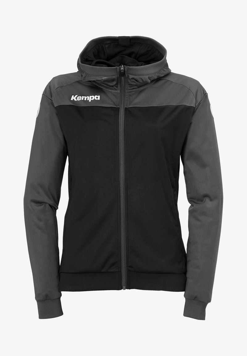 Veste à capuche noire et gris foncé, avec une fermeture éclair à l'avant, des poignets élastiques et le logo "Kempa" sur la poitrine, fabriquée dans un matériau lisse et léger.