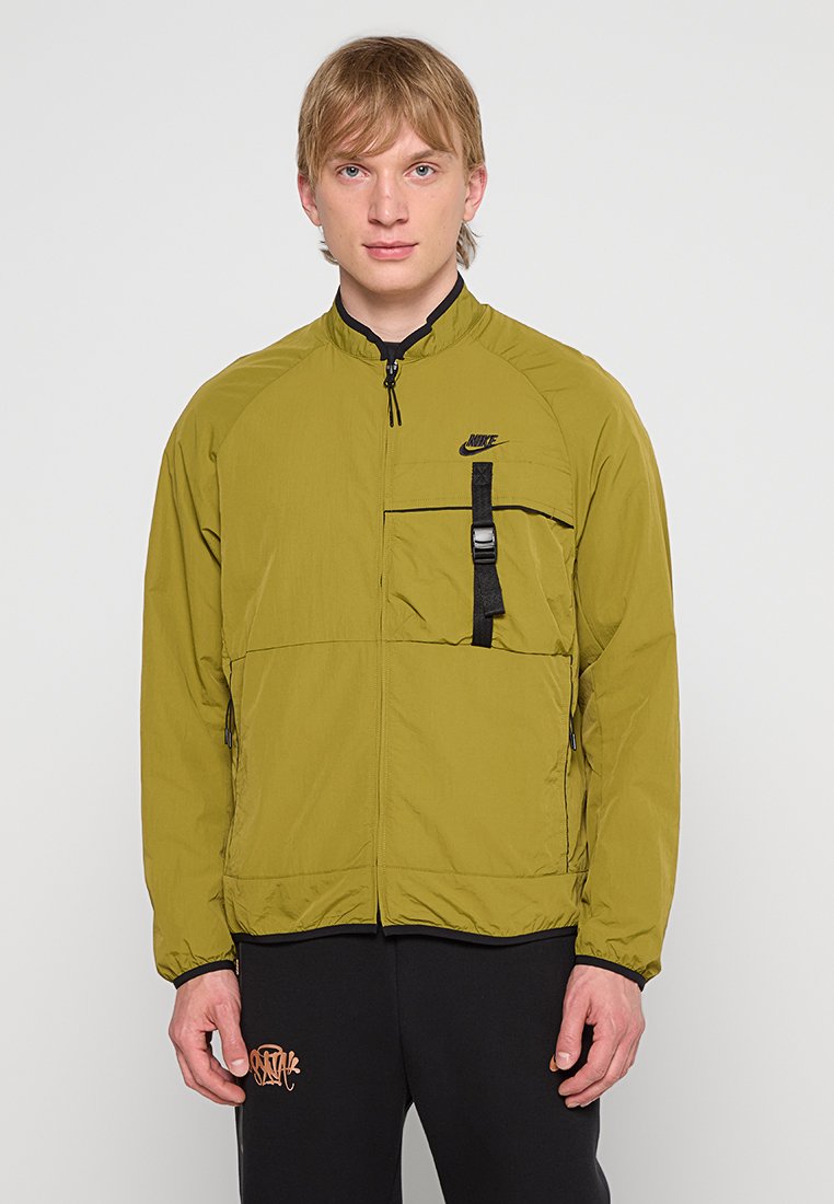 Nike Sportswear Regenjas mosterdgeel Nike Sportswear Regenjas mosterdgeel