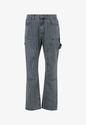 Hallide denim-stiilis kauboi püksid kõrge vöökohaga, laienevate jalgadega ja mitmete taskutega. Omab õmblusdetailide ning sileda, tekstuuriga pinna.