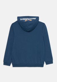 Felpa con cappuccio blu navy dal tessuto morbido, con un logo sul retro e polsini e orlo a coste. Design minimalista con vestibilità classica.