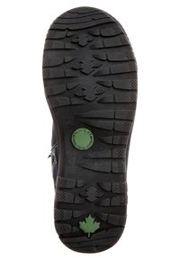 Semelle de chaussure en caoutchouc noir avec un motif texturé, arborant un logo circulaire vert et un design de feuille d'érable verte. Taille marquée comme 37.