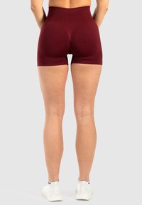 Smilodox ISSY SEAMLESS SCRUNCH  YOGA & PILATES - Tights - bordeaux