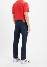 Levi's® Jeans Tapered Fit - dark-blue denim