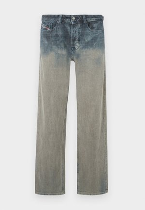 Faded denim jeans with a high waist, straight leg, and an ombré effect transitioning from dark blue to light gray at the bottom.
