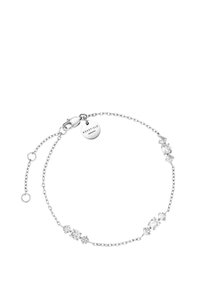 Silver chain bracelet featuring clear gemstone accents, interspersed with small decorative elements, and a lobster clasp with a brand tag.