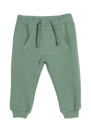 Grønne ribbede sweatpants med elastisk talje og snøre. Har sidelommer og tapered manchetter ved anklerne.