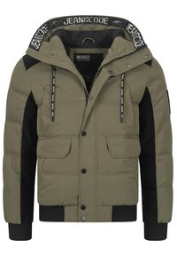 Doudoune vert olive avec des accents en velours côtelé noir, capuche avec cordon de serrage, fermeture éclair, poches à rabat et poignets côtes. Surface texturée.