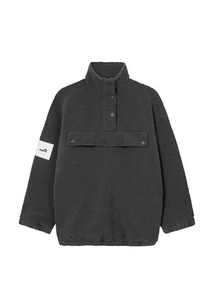 Veste à col montant en tissu polaire texturé de couleur gris foncé. Dotée d'un col haut, de boutons-pression et d'une poche avant avec des accents en métal.