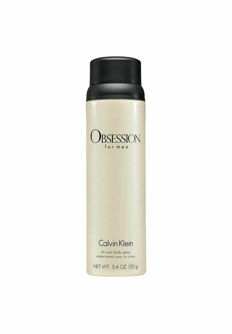 Beige cylindrisk sprayflaska med ett svart lock. Tryckt text som lyder "OBSESSION for men" och "Calvin Klein," med produktvikt angiven.