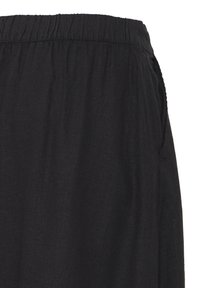 Pantalon noir avec taille élastique et poche latérale, en tissu léger.