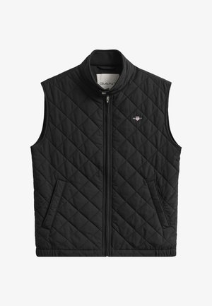 Czarna pikowana kamizelka z wysokim kołnierzem, z przodu zamek błyskawiczny i dwie boczne kieszenie. Na piersi małe logo. Gładka, lekka tkanina.