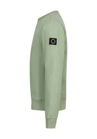 Grüner Sweatshirt mit Rundhalsausschnitt, gerippten Bündchen und Saum. Besitzt ein schwarzes Patch mit einem Augendesign am linken Ärmel. Weiche Textur.