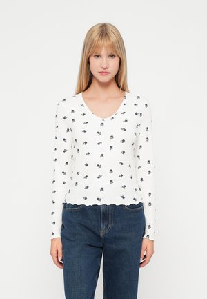 - Bluzka z długim rękawem