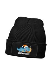 Black knit beanie featuring a rectangular patch with a cartoon blue dinosaur wearing a Santa hat, and the text “SLEEPSAURUS.”