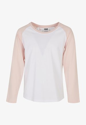 Hosszú ujjú baseball póló fehér testtel és puha rózsaszín raglán ujjakkal, kerek nyakkal és laza szabással. Pamut keverék anyag.