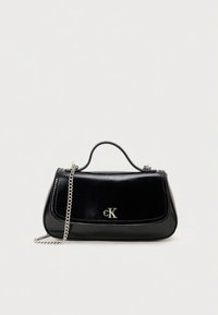Black leather handbag with a structured shape, silver chain strap, and a front clasp featuring the cK logo. Smooth texture and minimal design.