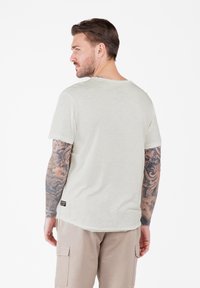 Key Largo MT JOURNEY ROUND - Camiseta estampada - offwhite