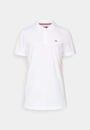 White short-sleeve polo shirt with a collar, featuring a small logo on the left chest and contrasting striped accents inside the collar.