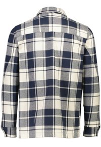 Camicia a quadri nei colori navy, crema e grigio; realizzata in un tessuto dalla consistenza morbida. Presenta maniche lunghe e un colletto classico.