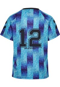 Kortärmad tröja med blå och lila vertikala ränder, nummer "12" i svart på baksidan, och texten "LYS UPP VÄRLDEN" nedan.