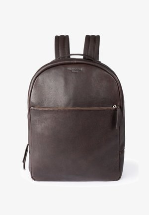 Dark brown leather backpack with front zip pocket, padded shoulder straps, and a top carry handle on a white background.