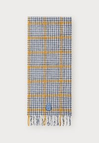 Woven scarf in blue and white houndstooth pattern, featuring yellow check accents. Finished with fringed edges and a blue logo patch.