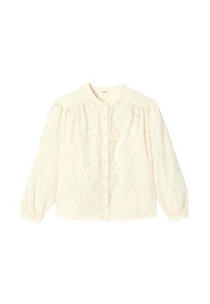 Blouse à manches longues couleur crème avec col rond, boutons sur le devant, épaules bouffantes, poignets élastiques et motif brodé à jour floral.