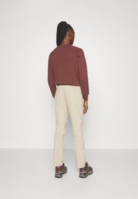 Mammut RUNBOLD ZIP OFF PANTS WOMEN - Hlače za na prostem - savannah