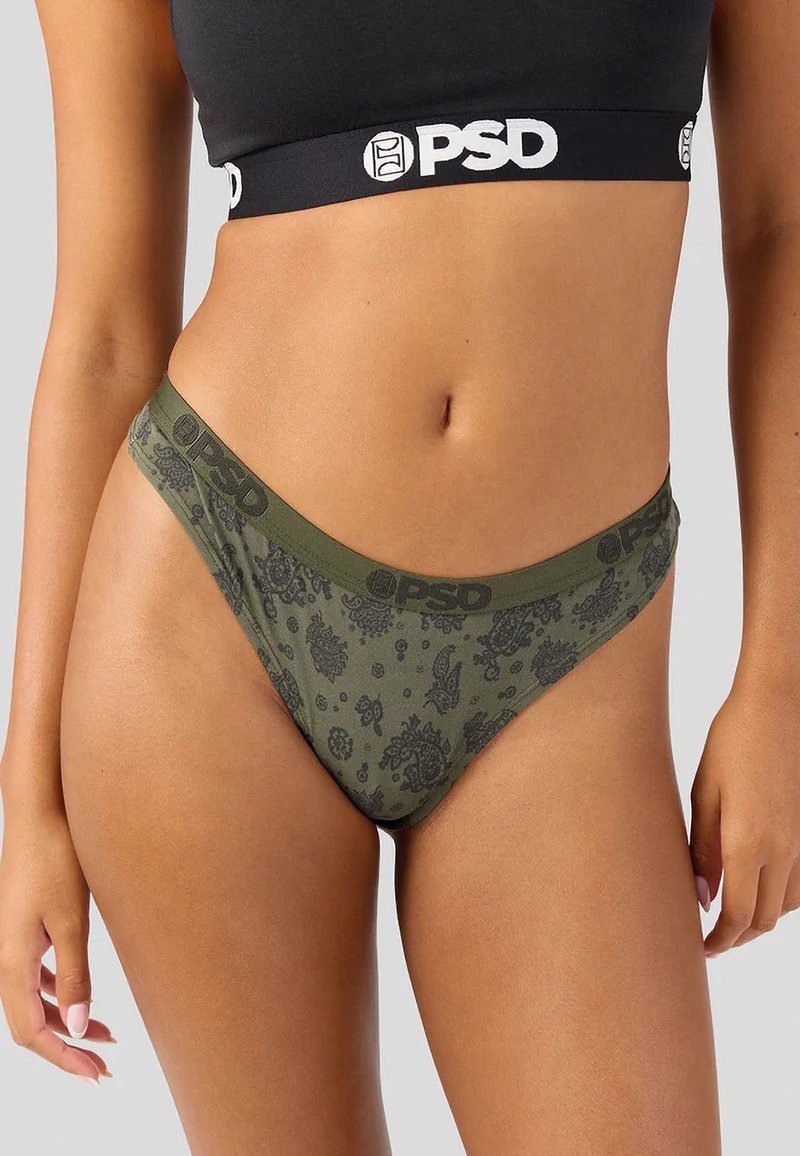 Groen gebloemd string ondergoed van zacht, rekbaar materiaal met een donkere tailleband met het "PSD"-logo.