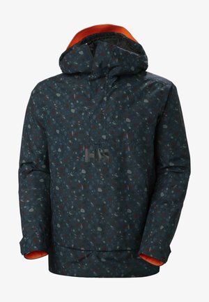 Water-resistant anorak in navy with a speckled pattern featuring gray, red, and blue accents. Includes a hood and orange inner lining.