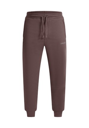 Bruine sweatpants met een textuurpatroon, verstelbare tailleband en zijzakken. Voorzien van een logo dat op de voorkant is gedrukt.