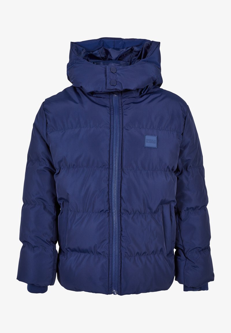 Mornarji modra puhovka z visokim ovratnikom, zadrgo spredaj in dvema stranskima žepoma. Ima elastične manšete in logotip na prsnem delu.