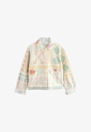 Giacca buttonata di un leggero beige con ricami geometrici e floreali pastello, dotata di colletto e due tasche frontali a pattina.