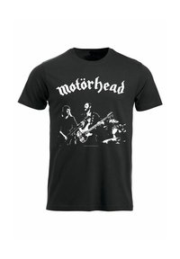 Camiseta de algodón negra con un gráfico blanco de músicos actuando, con "Motörhead" en la parte superior en una fuente negrita y estilizada.
