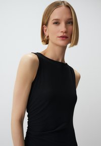 Jimmy Key SLEEVELESS BASIC MIDI - Robe en jersey - black