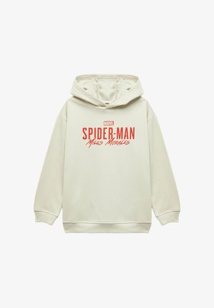 Hoodie couleur crème en tissu doux. Présente un graphique à l'avant de "MARVEL SPIDER-MAN Miles Morales" en rouge. Comprend une capuche avec cordon de serrage.