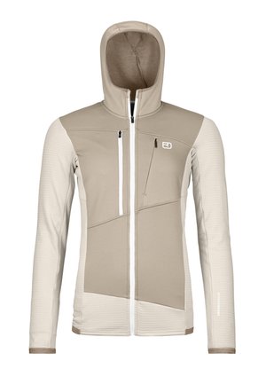 Beige hooded jacket with textured arms, white zipper, and angular panel design. Features a chest pocket and logo detail on the chest.