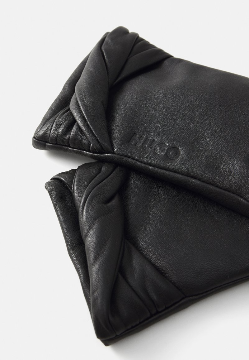 Hugo reversible gloves | Hermès Belgium
