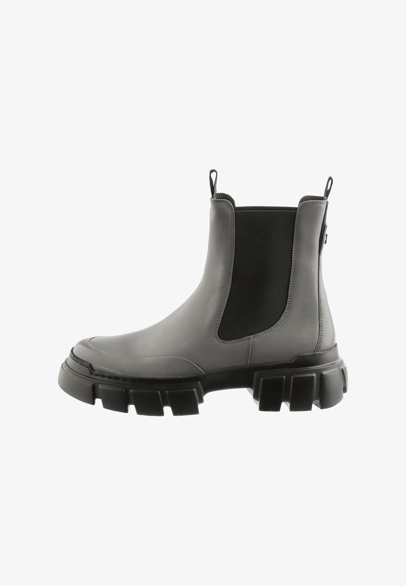 Gray leather Chelsea boots feature elastic side panels, a thick black rubber sole, and looped pull tabs for easy wear.