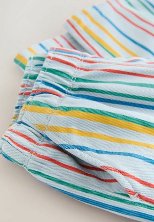 Colorful striped fabric featuring blue, yellow, red, and green lines. Soft texture with visible stitching and a casual fit design.