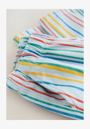 Barvna tkanina z modrimi, rumenimi, rdečimi in zelenimi črtami. Mehka tekstura z vidnimi šivi in priložnostna zasnova prileganja.