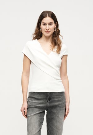 T-shirt con stampa - egret