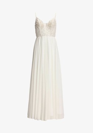 White sleeveless gown with beaded floral bodice, deep V neckline, thin straps, and long flowing pleated skirt.