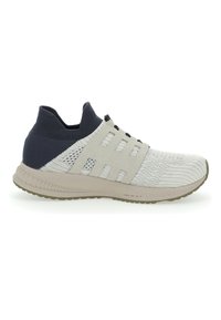 Lace-up athletic shoes in light gray and navy, featuring a knitted upper, elastic sock collar, and textured rubber outsole with flexible grooves.