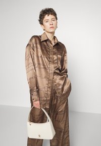 Heathe ORUKO OVERSIZE TROUSERS - Bukse - brown