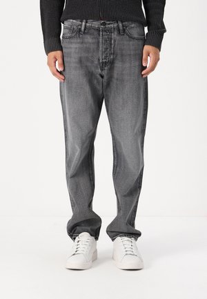 Gray denim jeans with a straight-leg fit, featuring five pockets, a button closure, and subtle fading. Paired with white sneakers.