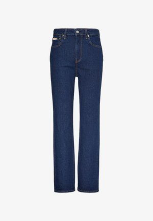 Σκούρα μπλε τζιν με ίσια γραμμή, μπροστινό κουμπί και φερμουάρ, σχέδιο με πέντε τσέπες και εμφανείς ραφές.