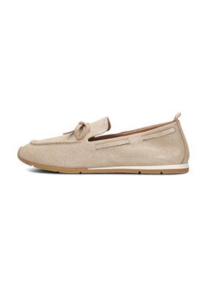 Beige suede loafers with a textured finish, round toe, bow accent, and light rubber sole. Features side cutouts and stitching details.