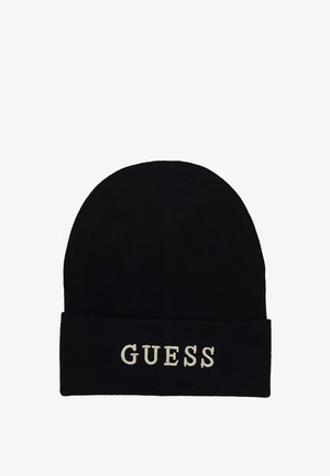 Berretto lavorato a maglia nero con risvolto. Presenta il testo bianco "GUESS" ricamato sul davanti. Morbido al tatto, design con cima arrotondata.
